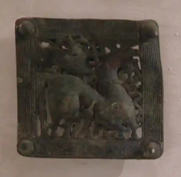 Belt-buckle with sheep and a weird-looking animal